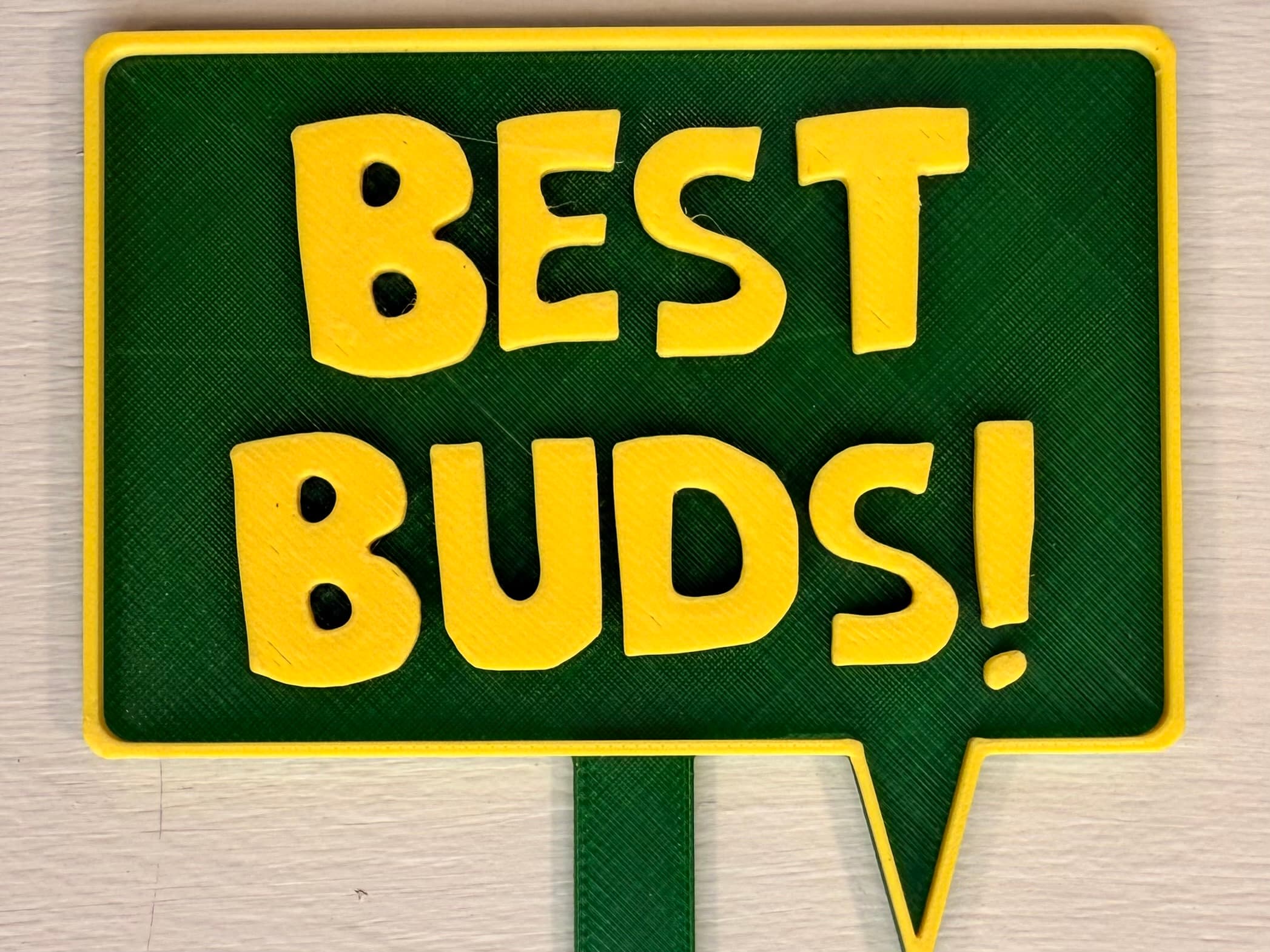 3D-printed pot pick with raised text reading 'Best Buds'