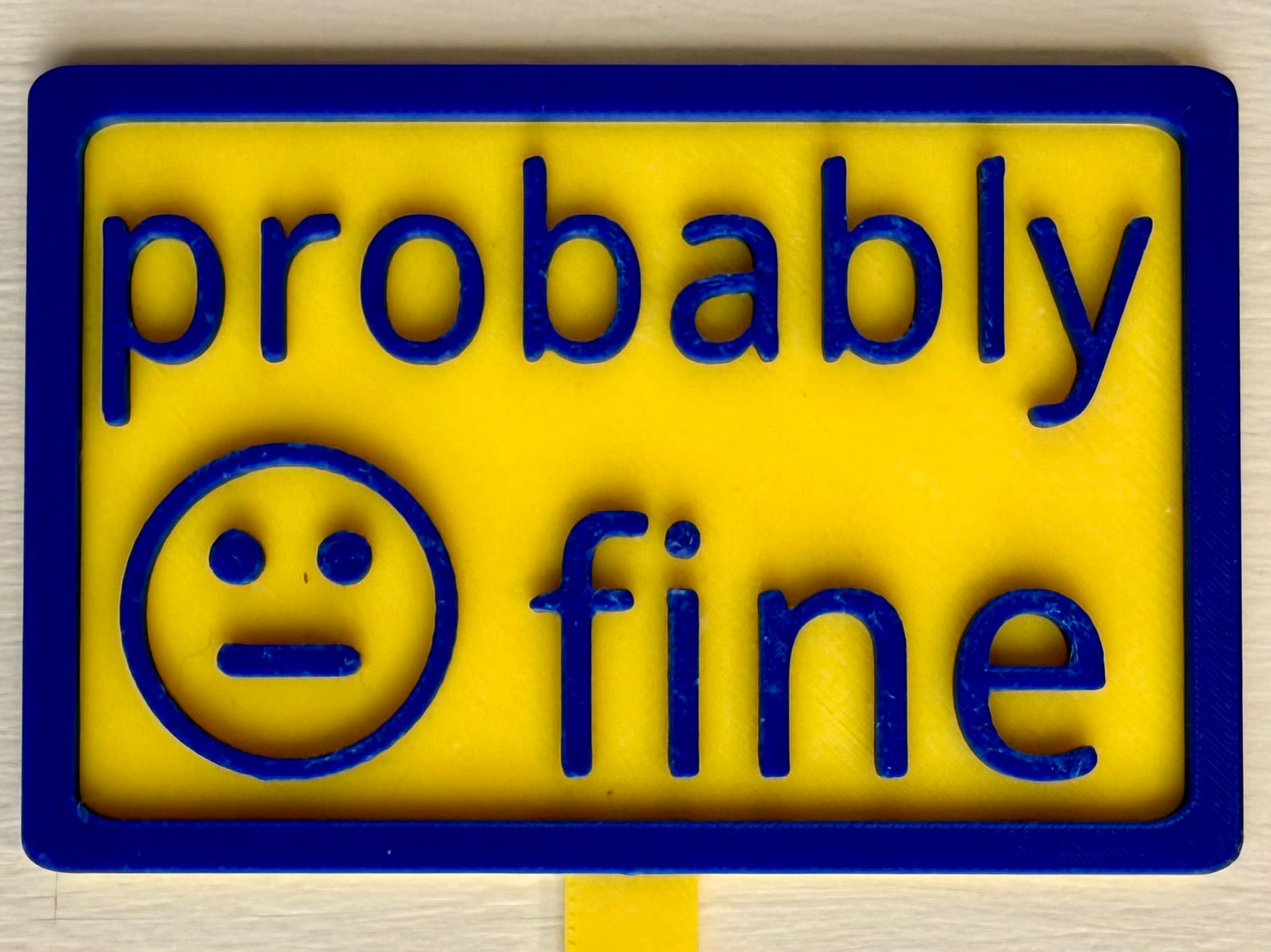 3D-printed pot pick with raised text reading 'Probably Fine'